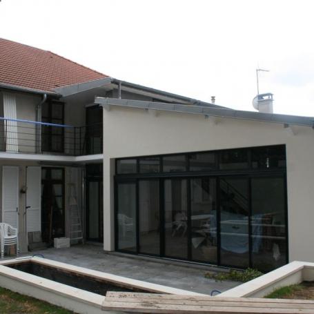 Modernisation d'une extension avec légère surélévation